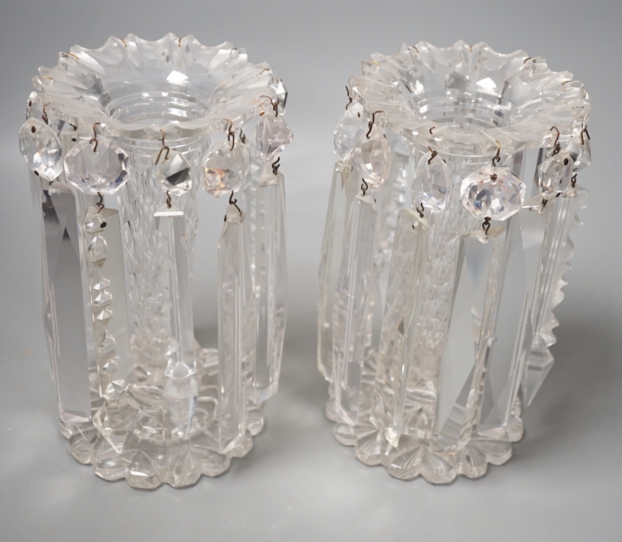 A pair of Victorian clear glass table lustres - 23cm high